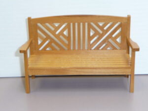 A dollhouse miniature bench